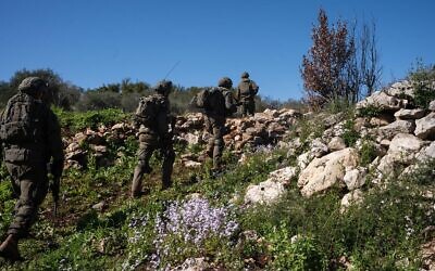 Troops of the 300th "Baram" Regional Brigade operate in southern Lebanon, in a handout photo issued by the military on March 9, 2026. (Israel Defense Forces)