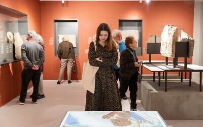 Visitors at the opening of 'As Soon as the War is Over,' at the Bible Lands Museum on February 23, 2026 (Yael Ilan)