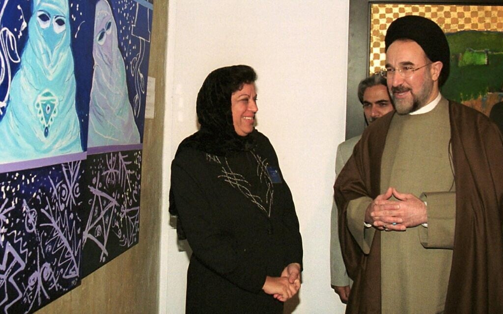 Iran's then-president Mohammad Khatami visits Tehran's Museum of Contemporary Arts, November 5, 2000, to inaugurate an exhibit titled "The Word of Islam". (ATTA KENARE / AFP)