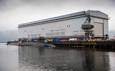 A Vanguard-class submarine undergoes maintenance at HM Naval Base Clyde at Faslane, north-west of Glasgow, Scotland, April 28, 2023. (Andy Buchanan / AFP)