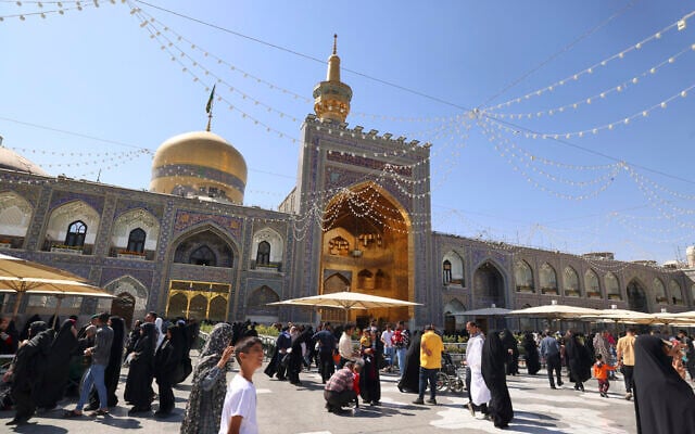 Pilgrims gather at the shrine of Imam Reza in the city of Mashhad, northeastern Iran, on October 1, 2023. (Photo by ATTA KENARE / AFP)