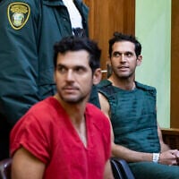 Alon Alexander, 37, right, and his twin brother, Oren, left, attend their bond hearing at the Richard E. Gerstein Justice Building on December 13, 2024, in Miami, Florida. (POOL / Getty Images via AFP)