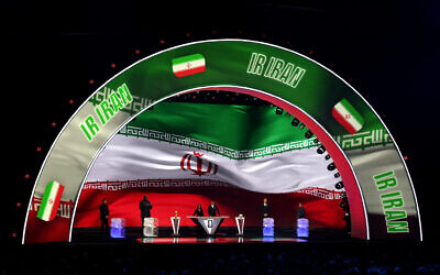 Iran is illuminated on the screen during the FIFA World Cup 2026 Official Draw at John F. Kennedy Center for the Performing Arts on December 5, 2025 in Washington, DC. (Kevin Dietsch/Getty Images/AFP)