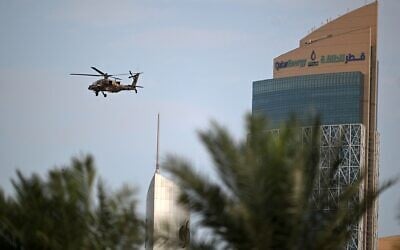 Illustrative: A helicopter, part of the Qatari Air Force, takes part in a flypast during celebrations marking Qatar National Day, in Doha on December 18, 2025. (Mahmud HAMS / AFP)