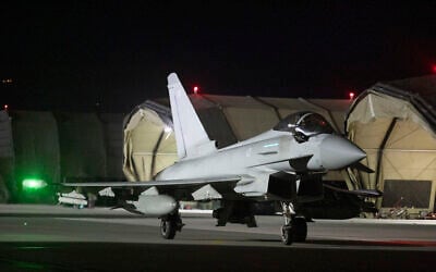 A handout photograph taken on January 3, 2025, and released by the British Ministry of Defense shows a Royal Air Force Typhoon aircraft on the tarmac at RAF Akrotiri, on the island of Cyprus. (Sgt. Lee Goddard / UK Ministry of Defense / AFP)