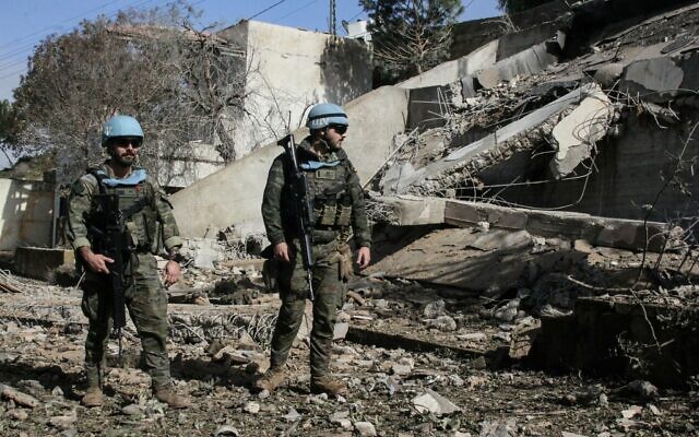 United Nations Spanish UNIFIL forces inspect chalets after the Israeli army reportedly booby-trapped and blew them up at dawn, on the outskirts of the town of al-Khiam, southern Lebanon on January 31, 2026. (Photo by Rabih DAHER / AFP)