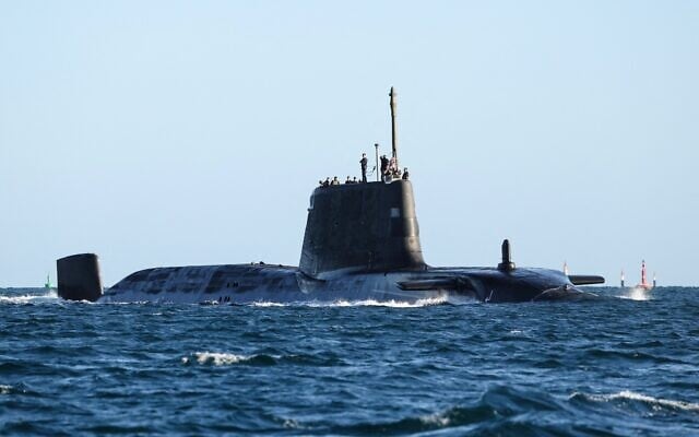 This handout image taken and released by the United Kingdom's Ministry of Defense on February 22, 2026, shows the HMS Anson submarine in transit. (Photo by Handout / Ministry of Defense (United Kingdom) / AFP) This handout image taken and released by the United Kingdom's Ministry of Defense on February 22, 2026, shows the HMS Anson submarine in transit. (Photo by Handout / Ministry of Defense (United Kingdom) / AFP)
