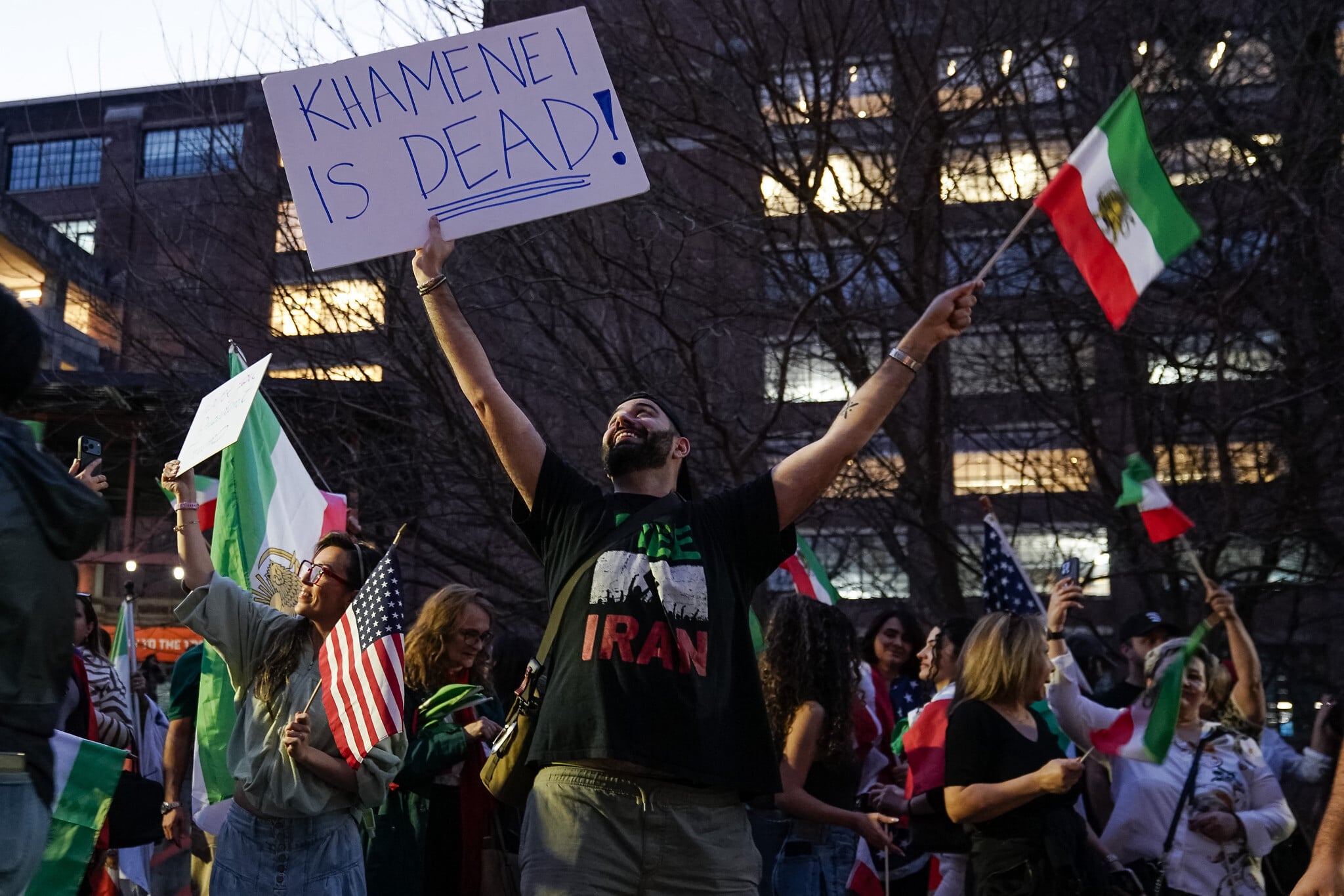 Iranian exiles across North America rally for strikes; others march against war