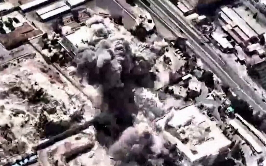 A video grab image taken from footage released by the Israeli military on March 1, 2026, shows what it says are large-scale strikes on "headquarters of the Iranian terror regime" in Tehran on March 1. (Handout / Israeli Army / AFP)