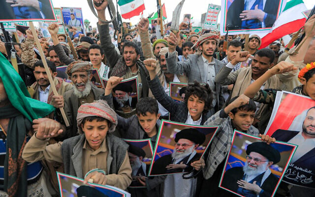 Mourners attend a memorial rally held by supporters of Yemen's Houthi rebels, a day after Iran's supreme leader was assassinated during US and Israeli strikes on Tehran, in the Houthi-held capital Sanaa on March 1, 2026. (Mohammed Huwais/AFP)
