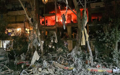 A fire is seen in a damaged building after an Israeli airstrike in response to Hezbollah rocket and drone fire in Beirut's southern suburb neighborhood of Haret Hreik on March 2, 2026 (AFP) A fire is seen in a damaged building after an Israeli airstrike in response to Hezbollah rocket and drone fire in Beirut's southern suburb neighborhood of Haret Hreik on March 2, 2026 (AFP)