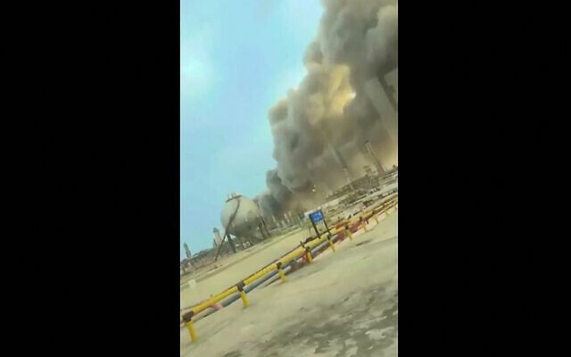 This video grab taken from UGC images posted on social media on March 2, 2026, shows smoke billowing from a Saudi oil refinery at the Ras Tanura oil production plant, near Dammam in Saudi Arabia's eastern province, after an attack (Handout / UGC / AFP)