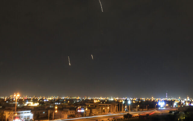 Iranian missiles are seen in the skies over Doha on March 3, 2026. (MAHMUD HAMS / AFP)