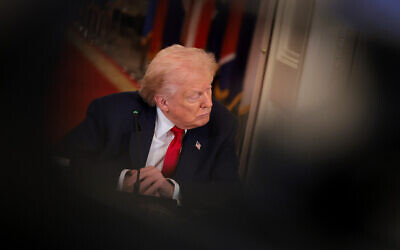 US President Donald Trump looks on during a roundtable discussion on college sports in the East Room of the White House in Washington, DC, March 6, 2026. (Anna Moneymaker/ Getty Images via AFP)