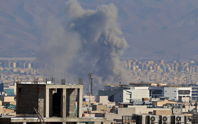 Smoke rises from the site of airstrikes in a central area of the Iranian capital Tehran on March 6, 2026. (ATTA KENARE / AFP) Smoke rises from the site of airstrikes in a central area of the Iranian capital Tehran on March 6, 2026. (ATTA KENARE / AFP)
