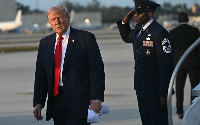 US President Donald Trump disembarks from Air Force One upon arrival at Miami International Airport in Miami, Florida, on March 7, 2026, after traveling to Dover Air Force Base for a dignified transfer solemn event for six US soldiers killed in an Iranian strike in Kuwait. (SAUL LOEB / AFP) US President Donald Trump disembarks from Air Force One upon arrival at Miami International Airport in Miami, Florida, on March 7, 2026, after traveling to Dover Air Force Base for a dignified transfer solemn event for six US soldiers killed in an Iranian strike in Kuwait. (SAUL LOEB / AFP)