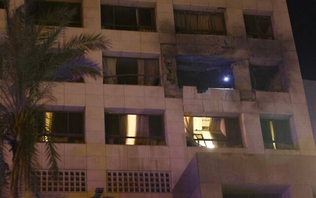First aid responders inspect a Ramada hotel room targeted by an Israeli strike, in Beirut's seaside Rawche area, on March 8, 2026. (Ibrahim AMRO / AFP) First aid responders inspect a Ramada hotel room targeted by an Israeli strike, in Beirut's seaside Rawche area, on March 8, 2026. (Ibrahim AMRO / AFP)