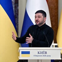 Ukraine's President Volodymyr Zelensky speaks during a press conference at Mariinskyi Palace in Kyiv on March 8, 2026. (Sergei SUPINSKY / AFP)