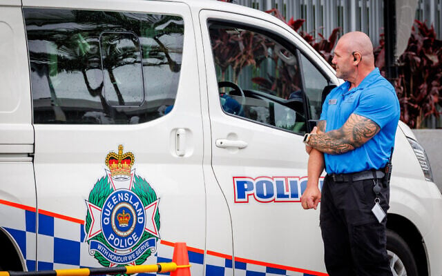 A hotel security member stands beside a police van at the entrance to the Royal Pines Resort, where members of the Iranian women's soccer team are staying, on the Gold Coast on March 9, 2026 (Patrick HAMILTON / AFP) A hotel security member stands beside a police van at the entrance to the Royal Pines Resort, where members of the Iranian women's soccer team are staying, on the Gold Coast on March 9, 2026 (Patrick HAMILTON / AFP)