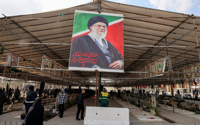 A banner depicting Iran's slain supreme leader Ayatollah Ali Khamenei hangs from a shade erected above the graves of recently-buried people killed in US-Israeli airstrikes at Beheshta Zahra cemetery on the southern outskirts of Tehran on March 9, 2026. (Atta Kenare / AFP) A banner depicting Iran's slain supreme leader Ayatollah Ali Khamenei hangs from a shade erected above the graves of recently-buried people killed in US-Israeli airstrikes at Beheshta Zahra cemetery on the southern outskirts of Tehran on March 9, 2026. (Atta Kenare / AFP)