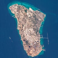 This handout image taken by the European Space Agency, captured by the Copernicus Sentinel-2 satellite, shows a view of Iran's Kharg Island, which hosts the country's main crude export terminal and is responsible for the overwhelming majority of its oil shipments to the world, about 30 kilometers south of the mainland in the north of the Gulf, on March 7, 2026. (European Space Agency/AFP)
