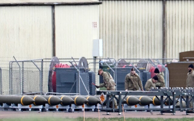 Members of the US Air Force (USAF) prepare munitions at RAF Fairford in southwest England on March 10, 2026, after USAF B-1 Lancer bomber jets and Air Force Boeing B-52 Stratofortress bombers landed at the RAF base. (Photo by Henry NICHOLLS / AFP) Members of the US Air Force (USAF) prepare munitions at RAF Fairford in southwest England on March 10, 2026, after USAF B-1 Lancer bomber jets and Air Force Boeing B-52 Stratofortress bombers landed at the RAF base. (Photo by Henry NICHOLLS / AFP)