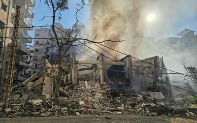 Smoke billows from the site of an Israeli airstrike that targeted the Hadath Lailaky neighborhood in Beirut's southern suburbs on March 11, 2026. (AFP) Smoke billows from the site of an Israeli airstrike that targeted the Hadath Lailaky neighborhood in Beirut's southern suburbs on March 11, 2026. (AFP)