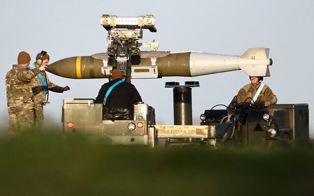USAF military ground personnel load Joint Direct Attack Munitions (JDAM) into a US Air Force (USAF) B-1 Lancer bomber on the tarmac at RAF Fairford in south-west England on March 11, 2026 (Henry NICHOLLS / AFP) USAF military ground personnel load Joint Direct Attack Munitions (JDAM) into a US Air Force (USAF) B-1 Lancer bomber on the tarmac at RAF Fairford in south-west England on March 11, 2026 (Henry NICHOLLS / AFP)