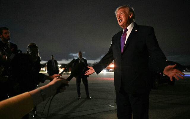 US President Donald Trump speaks to journalists upon returning to Joint Base Andrews, Maryland, on March 11, 2026. (Jim Watson/AFP) US President Donald Trump speaks to journalists upon returning to Joint Base Andrews, Maryland, on March 11, 2026. (Jim Watson/AFP)