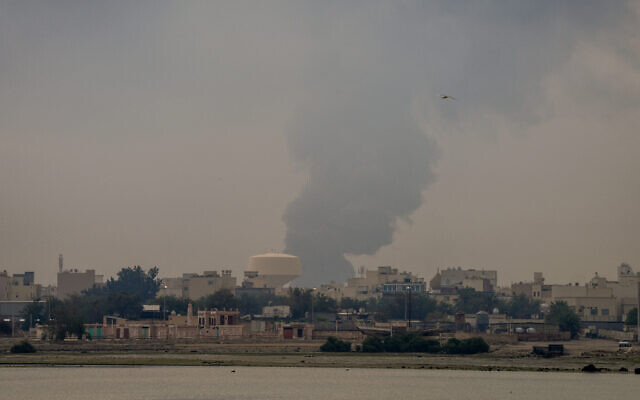 A plume of smoke rises after a reported Iranian strike on fuel tanks in Muharraq, Bahrain, on March 12, 2026. (Fadhel MADHAN / AFP) / A plume of smoke rises after a reported Iranian strike on fuel tanks in Muharraq, Bahrain, on March 12, 2026. (Fadhel MADHAN / AFP) /