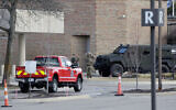 Law enforcement is seen at the Temple Israel synagogue in West Bloomfield, Michigan, on March 12, 2026, after an armed terrorist drove a vehicle into the building. (Jef Kowalsky/AFP)