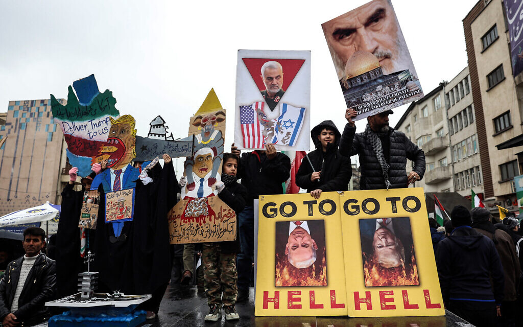 Iranians hold up posters as they take part in a Quds Day, or Jerusalem Day, rally in Tehran, on March 13, 2026.(AFP) Iranians hold up posters as they take part in a Quds Day, or Jerusalem Day, rally in Tehran, on March 13, 2026.(AFP)