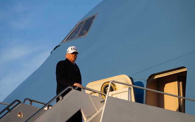 US President Donald Trump boards Air Force One as he departs Joint Base Andrews in Maryland, March 13, 2026. (Saul Loeb / AFP) US President Donald Trump boards Air Force One as he departs Joint Base Andrews in Maryland, March 13, 2026. (Saul Loeb / AFP)