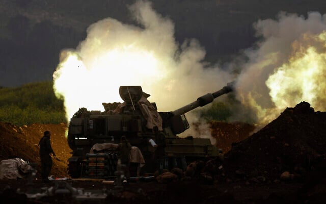 An IDF artillery unit deployed in northern Israel fires toward southern Lebanon on March 14, 2026. (Jalaa Marey/AFP) An IDF artillery unit deployed in northern Israel fires toward southern Lebanon on March 14, 2026. (Jalaa Marey/AFP)