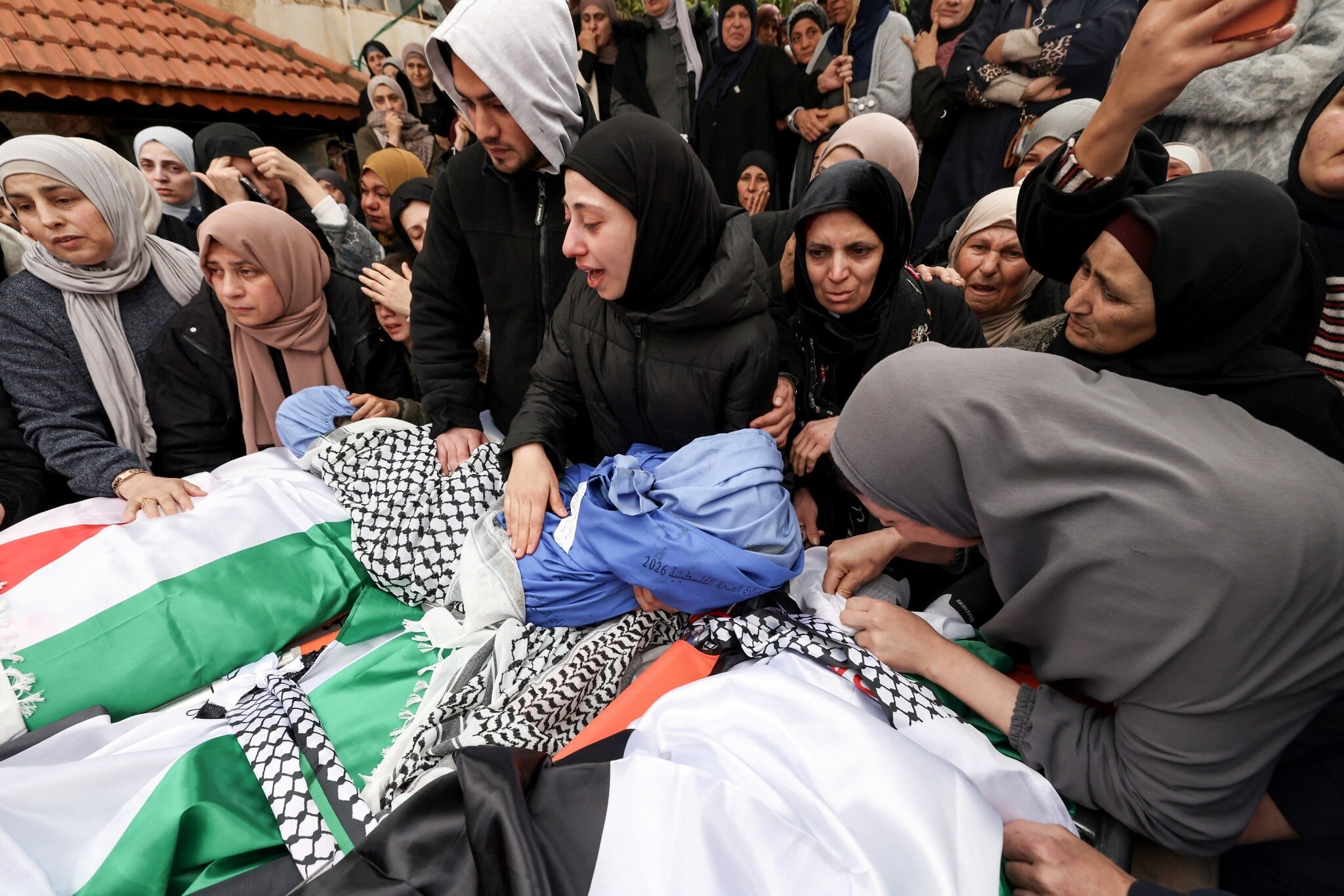 Israeli forces kill West Bank Palestinian couple, 2 children; police say car sped at troops