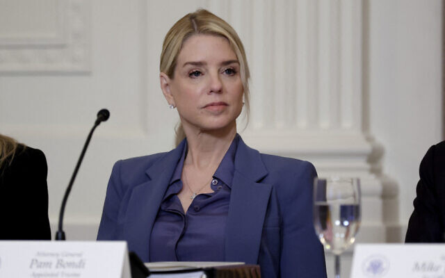 US Attorney General Pam Bondi listens as US President Donald Trump speaks during a lunch in the East Room of the White House on March 16, 2026 in Washington, DC. (ALEX WONG / GETTY IMAGES NORTH AMERICA / Getty Images via AFP) US Attorney General Pam Bondi listens as US President Donald Trump speaks during a lunch in the East Room of the White House on March 16, 2026 in Washington, DC. (ALEX WONG / GETTY IMAGES NORTH AMERICA / Getty Images via AFP)