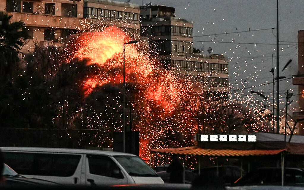 A fireball rises from the site of an Israeli airstrike that targeted a building in Beirut's Bashoura neighborhood on March 18, 2026 (FADEL itani / AFP)