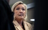 President of the Rassemblement National (RN) parliamentary group Marine Le Pen reacts as she visits to support a local candidate for the municipal elections in Oignies, northern France, on March 18, 2026. (Elise HOUBEN / AFP)