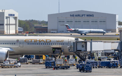 An Etihad Airways flight headed to Zayed International Airport in Abu Dhabi, UAE, on March 20, 2026. (Grant Baldwin / Getty Images North America / Getty Images via AFP)