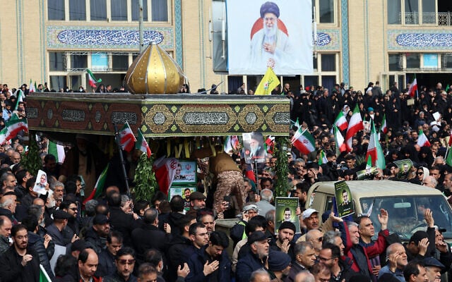 Iranians attend the funeral ceremony of Iran's Revolutionary Guards spokesperson Ali Mohammad Naini, who was killed in US-Israeli strikes, in Tehran on March 21, 2026. (AFP) Iranians attend the funeral ceremony of Iran's Revolutionary Guards spokesperson Ali Mohammad Naini, who was killed in US-Israeli strikes, in Tehran on March 21, 2026. (AFP)