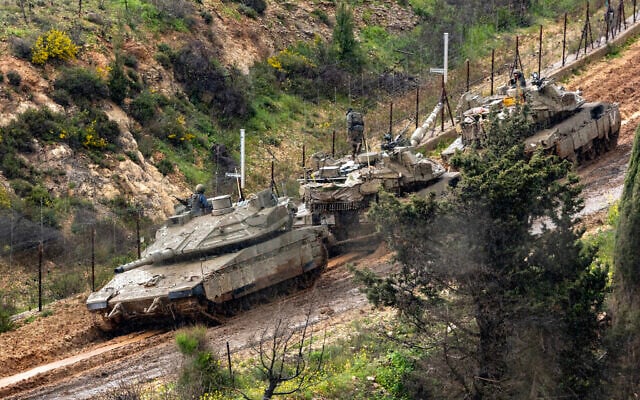 Israeli forces are seen along the border with Lebanon on March 21, 2026. (Odd Andersen/AFP)