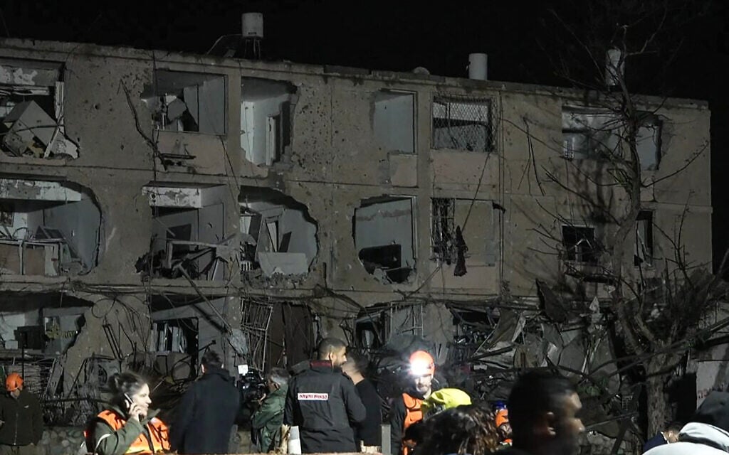 This frame grab from AFPTV footage shows damage to an apartment building in the southern city of Dimona that was damaged by an Iranian ballistic missile strike on March 21, 2026. (Jorge Novominsky/AFPTV/AFP)