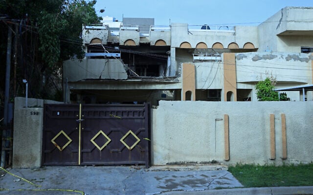 This photograph shows a house that was damaged by a drone strike in the Al-Saydiya neighborhood of Baghdad, Iraq, on March 22, 2026. (Murtaja LATEEF / AFP) This photograph shows a house that was damaged by a drone strike in the Al-Saydiya neighborhood of Baghdad, Iraq, on March 22, 2026. (Murtaja LATEEF / AFP)