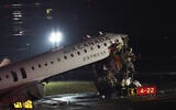 An Air Canada Express CRJ-900 sits on the runway after colliding with a Port Authority fire truck at LaGuardia Airport in New York, on March 23, 2026 (ANGELA WEISS / AFP)