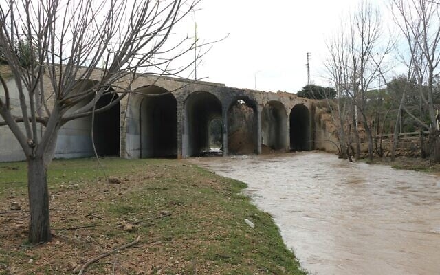 A photograph taken on March 23, 2026, shows the Litani River and the aftermath of the Israeli airstrike that targeted the Qasmiyeh bridge, located on a main highway linking villages in the Tyre district with others further north, in southern Lebanon. (Kawnat HAJU / AFP) A photograph taken on March 23, 2026, shows the Litani River and the aftermath of the Israeli airstrike that targeted the Qasmiyeh bridge, located on a main highway linking villages in the Tyre district with others further north, in southern Lebanon. (Kawnat HAJU / AFP)