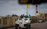 A United Nations Interim Force in Lebanon (UNIFIL) convoy drives near the southern Lebanese city of Tyre on March 23, 2026. (Dimitar DILKOFF / AFP)