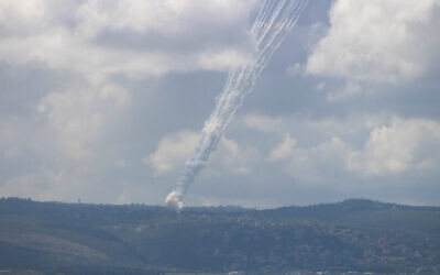 This photograph taken from the southern city of Tyre, shows rockets fired from Lebanon at Israel on March 24, 2026. (KAWANT HAJU / AFP) This photograph taken from the southern city of Tyre, shows rockets fired from Lebanon at Israel on March 24, 2026. (KAWANT HAJU / AFP)