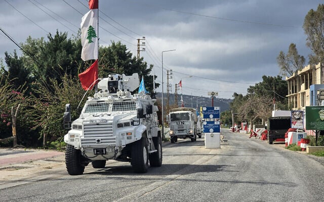 United Nations peacekeepers with the UN Interim Force in Lebanon (UNIFIL) drive past a Lebanese army outpost in the area of Naqura in southern Lebanon on March 27, 2026. (KAWNAT HAJU / AFP) United Nations peacekeepers with the UN Interim Force in Lebanon (UNIFIL) drive past a Lebanese army outpost in the area of Naqura in southern Lebanon on March 27, 2026. (KAWNAT HAJU / AFP)