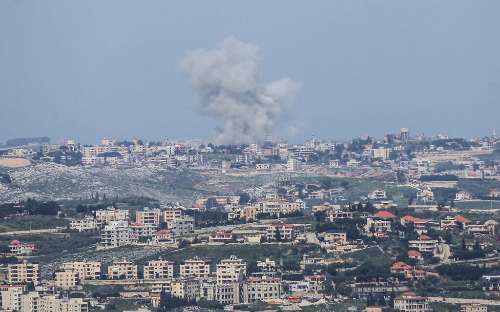 A photograph taken from the southern Lebanese area of Marjayoun shows smoke rising from the site of an Israeli airstrike that targeted Hezbollah in the village of Deir al-Zahrani on March 28, 2026 (AFP)