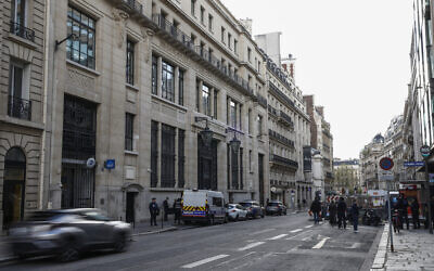 Police and security stand outside a Bank of America building following an apparent attempted bombing attack in the 8th arrondissement of Paris, France, March 28, 2026. (Sebastien DUPUY / AFP)